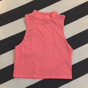 Pink high neck tank top.